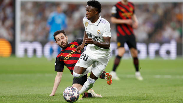 Vinicius dribbling against Man City.